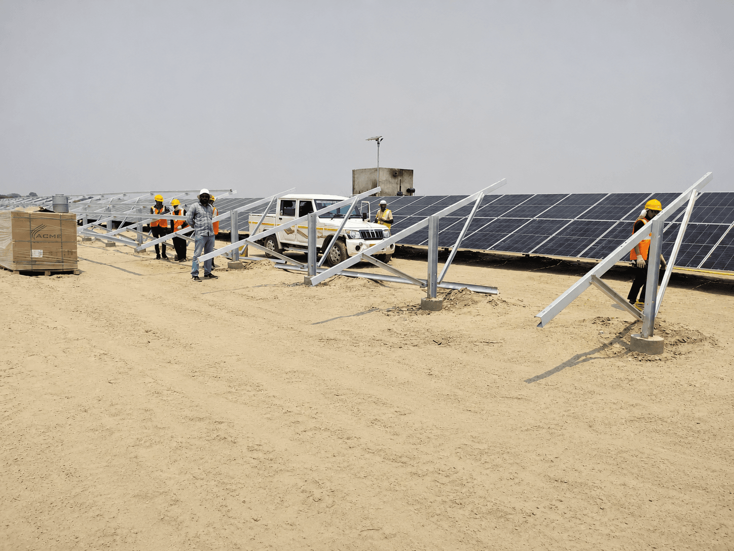 Prakash crews mounting solar modules at an open access site in Uttar Pradesh